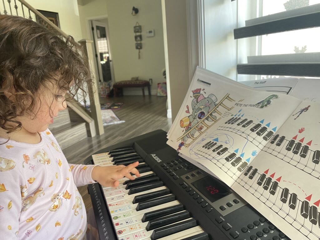 music student learning piano at Harana Music Academy